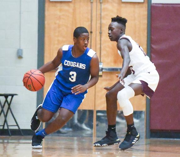 PHOTOS: Alex City Middle School, Central Coosa battle on the hardwood