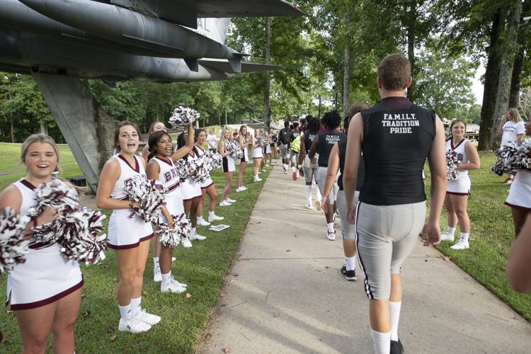 PHOTOS: Ben Russell hosts Huffman in the first game of the season