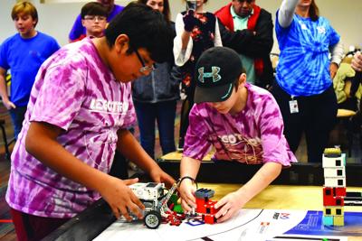 Local schools compete with LEGO robots