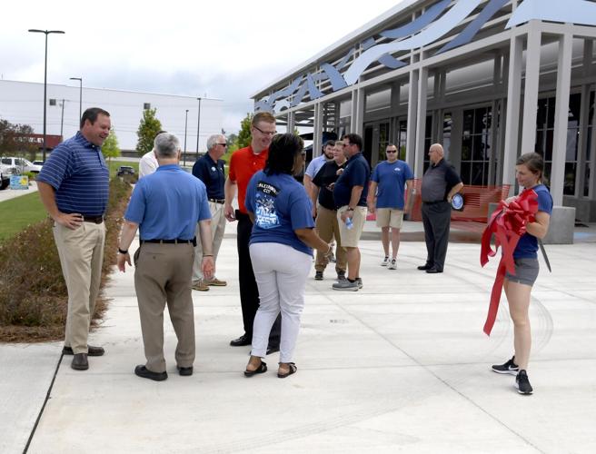 PHOTOS: Russell Marine cuts ribbon on outdoor center