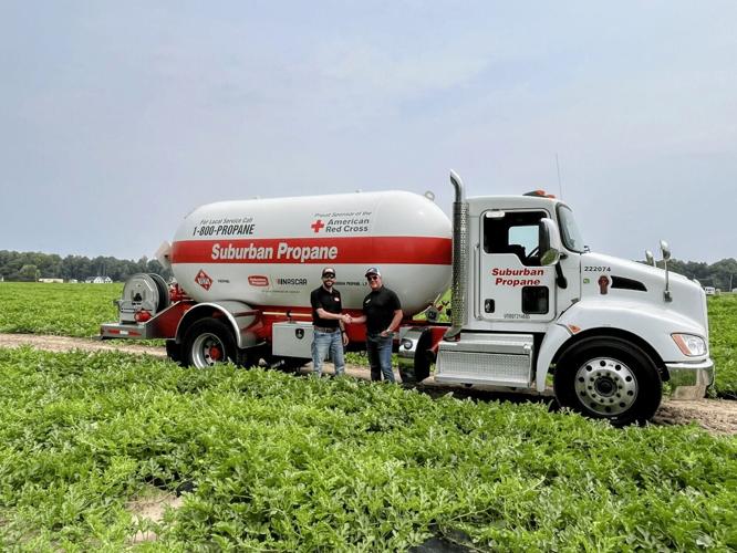 Ross Chastain and Michael Stivala, CEO of Suburban Propane, at a Melon 1 Farm location. Coutresy of Suburban Propane