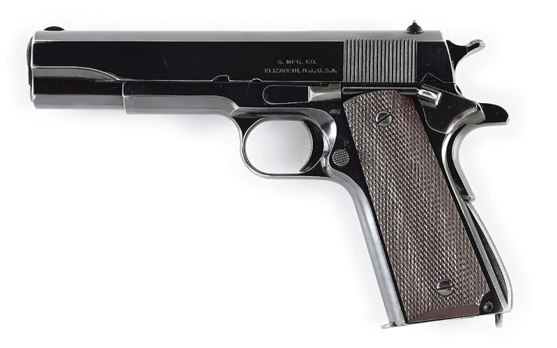 Singer Model 1911A1 .45 ACP semi-automatic pistol, manufactured by the Singer Sewing Machine Co in 1940, one of 500 produced from the original contract. Sold for $184,500