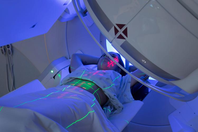 Woman Receiving Radiation Therapy/ Radiotherapy Treatments for Cancer