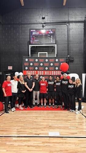 The Shoot 360 corporate team celebrates the grand opening of a new tech-powered basketball training facility inside LA Fitness in Hillsboro, Oregon. Opened May 16, 2026, the location is the first to launch under Shoot 360’s pilot program with Fitness In...