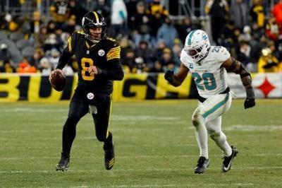 Pittsburgh quarterback Aaron Rodgers looks to pass in the Steelers' win over the Miami Dolphins