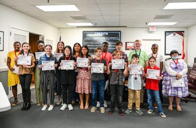 ACS students win over a dozen awards in technology fair