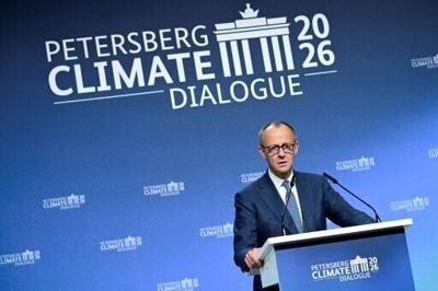 German Chancellor Friedrich Merz delivers a speech during the Petersberg Climate Dialogue in Berlin