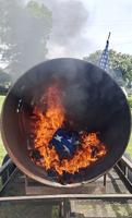 Scouts properly dispose of flags during ceremony