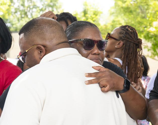 PHOTOS: Residents gather for murder victim and justice