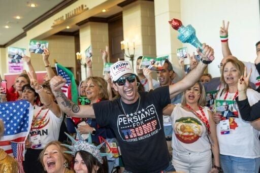 Attendees chant slogans in support of the Iranian opposition and thank US President Donald Trump during the Conservative Political Action Conference in Grapevine, Texas