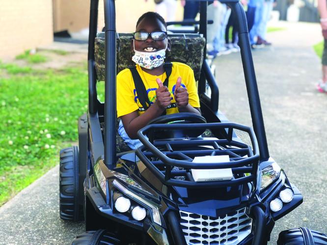 WHS robotics students using skills to help others