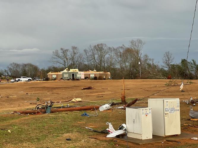 PHOTOS: Tornado-warned storm damages homes in Elmore County