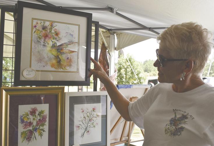 PHOTOS: One-of-a-kind artwork showcased at Arti Gras