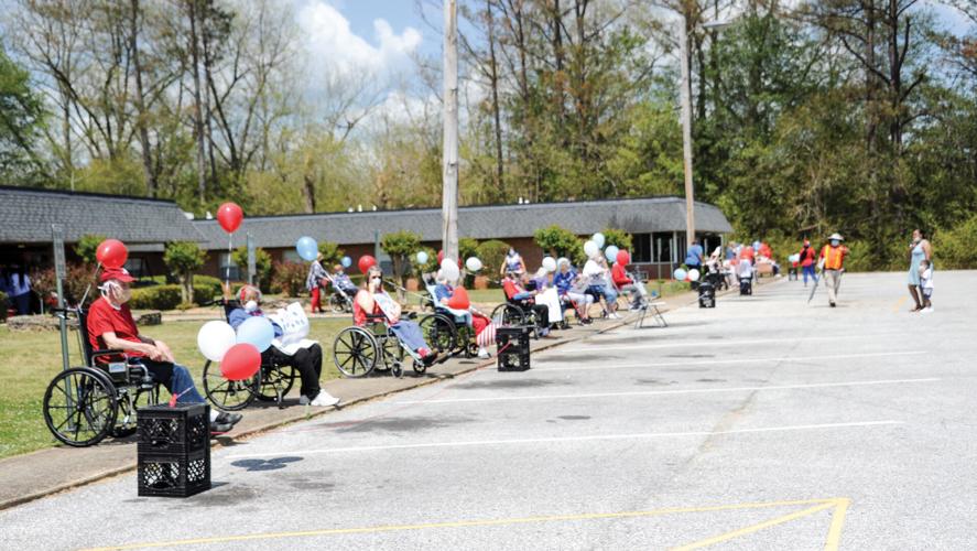 PHOTOS: Adams Health & Rehab Center holds drive-by parade
