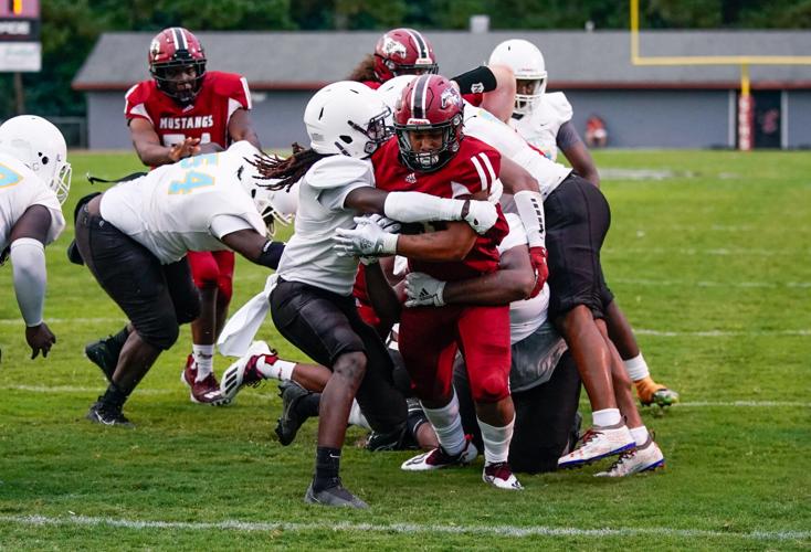 PHOTOS: Rain doesn't stop Stanhope Elmore's 37-0 shutout of Selma