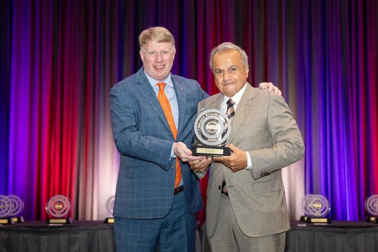 Anthony Imperato, Founder and CEO of Henry Repeating Arms, receives the 2026 Golden Bullseye Pioneer Award from Mark Keefe, Editorial and Public Affairs Director, during the National Rifle Association Annual Meetings & Exhibits in Houston, Texas, on Fri...