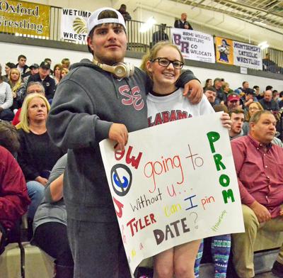 PROMPOSAL PINFALL: SEHS wrestling manager accepts cheerleader’s prom invite