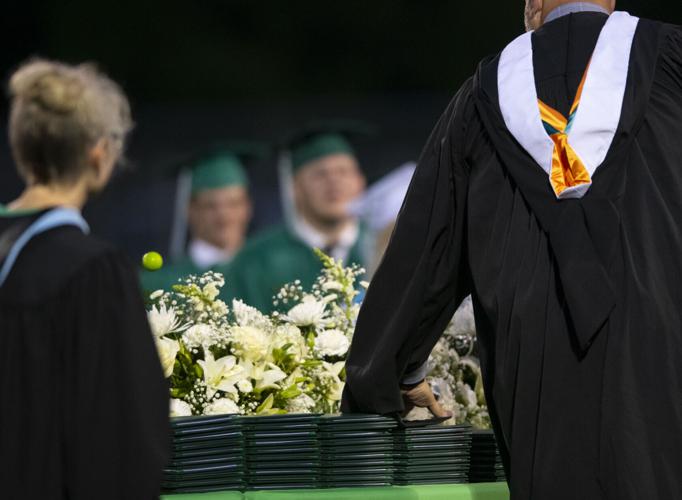 PHOTOS: Golfball handshake for graduation