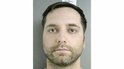 Burkhalter charged with having sex with student; held on $1.5 million bond