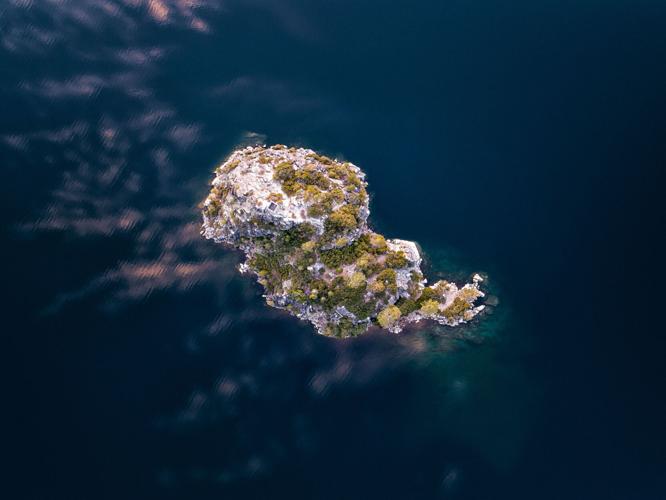 Fannette Island in Emerald Bay, one of five Lake Tahoe tidal monitoring stations tracked by the new Jetsetter Guide Tidal Prediction System. The sheltered geography of Emerald Bay creates a 40-minute tide delay compared to open-water stations. (Photo: J...
