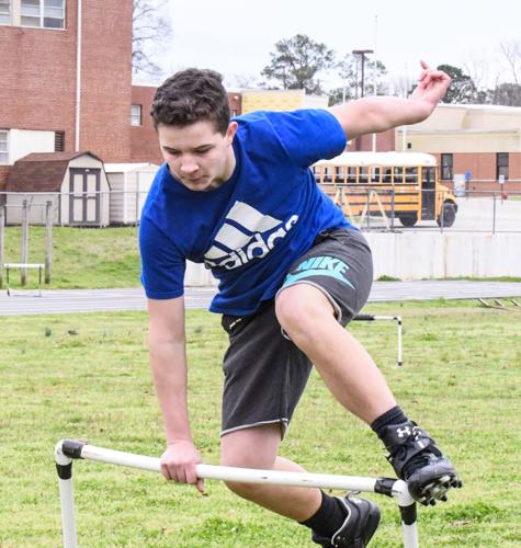 PHOTOS: Dadeville still working despite not having coach