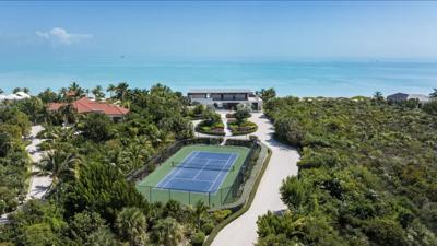 The stunning tennis court set back from the ocean at Clevelander in Turks & Caicos