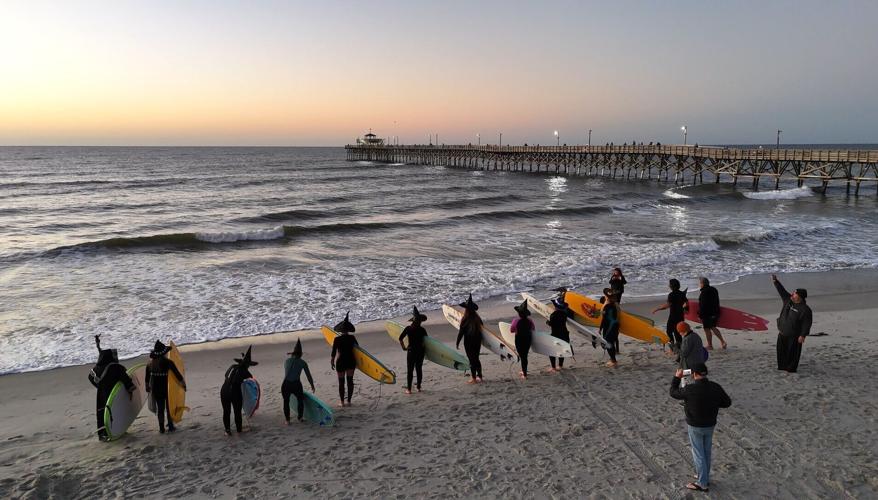 This fall, costumed surfers with black hats and broomsticks will paddle into the Atlantic for the fifth annual Witches Sunrise Surf in North Myrtle Beach. The event has become one of the area's most delightfully unexpected Halloween traditions. Credit: ...