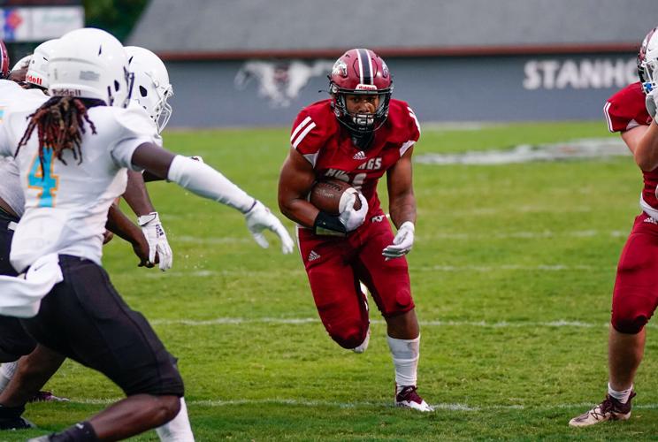 PHOTOS: Rain doesn't stop Stanhope Elmore's 37-0 shutout of Selma