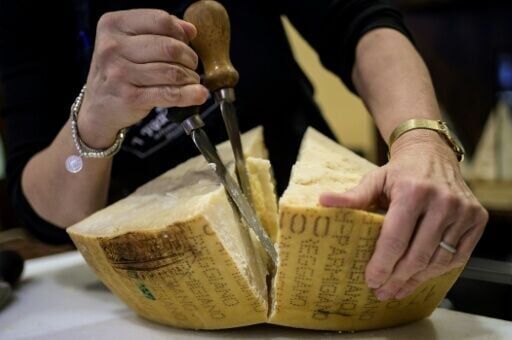 Ranked among the kings of Italian cheese, with its cows fed on hay and grass, Parmesan is facing slowing sales at home as the country's population declines