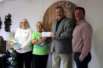 Ferst Readers receives a check from County BOE
