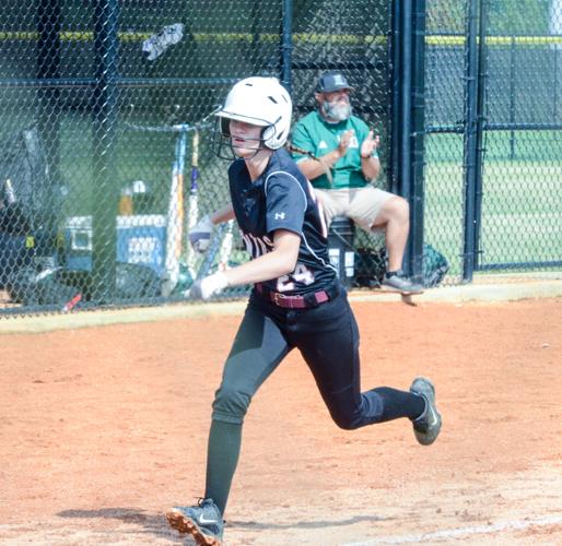 PHOTOS: Area teams play in regional softball tourney