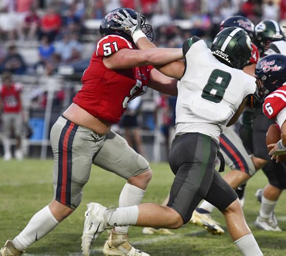 PHOTOS: Edgewood Academy football drops season opener