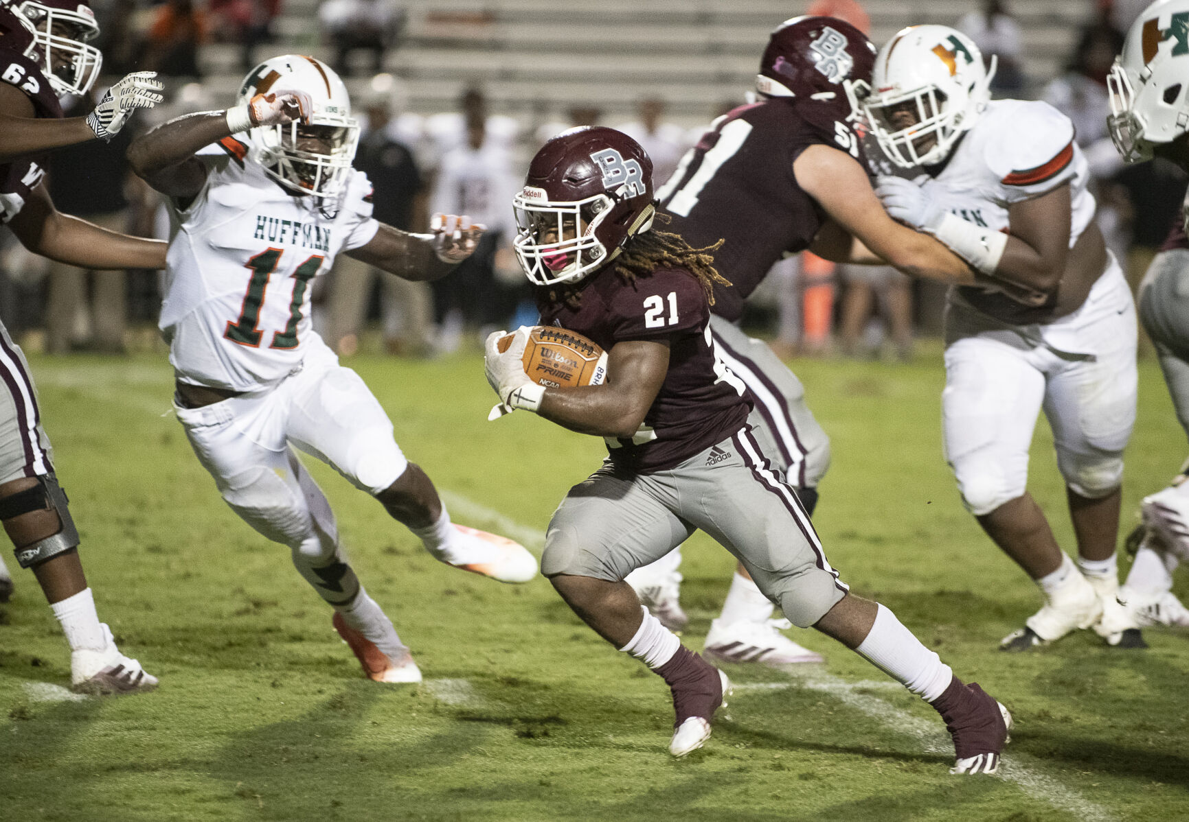 PHOTOS: Ben Russell hosts Huffman in the first game of the season