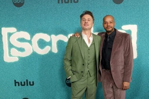 Zach Braff (L) and Donald Faison are reprising their roles in the return of medical sitcom 'Scrubs'