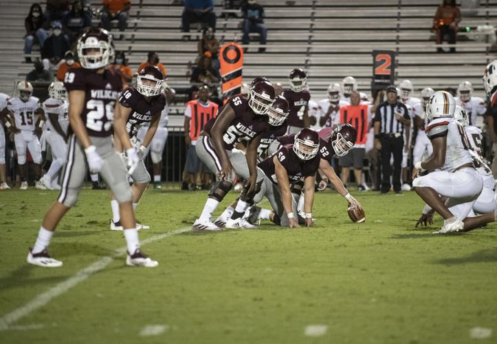 PHOTOS: Ben Russell hosts Huffman in the first game of the season
