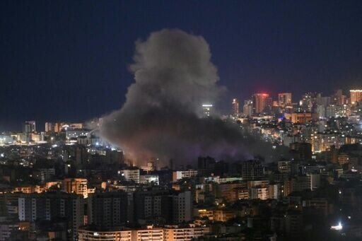 Smoke rises from the site of an Israeli airstrike that targeted an area in Beirut's southern neighborhood