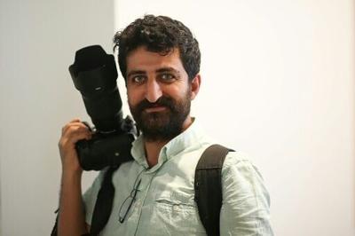 Agence France-Presse's Turkish photographer Yasin Akgul was arrested at his home at dawn on March 24