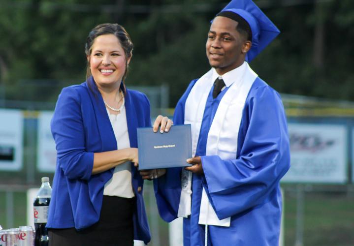 Graduates carry on ‘once a Rebel, always a Rebel’