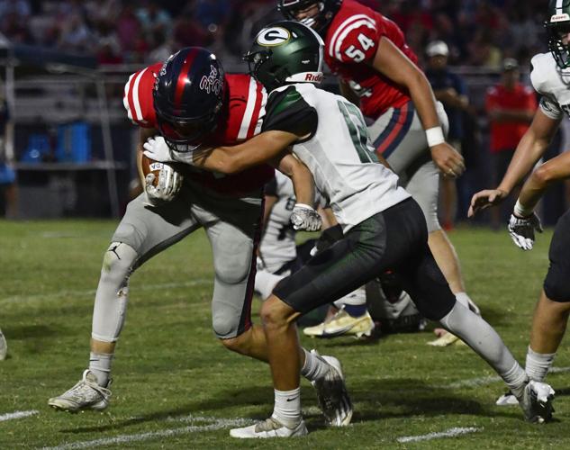 PHOTOS: Edgewood Academy football drops season opener