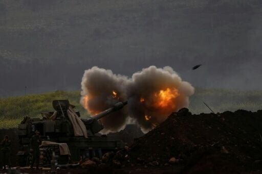 An Israeli artillery in northern Israel fires towards southern Lebanon