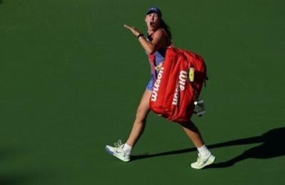 Defending champion Mirra Andreeva reacts to a hostile crowd after falling to Katerina Siniakova in the third round at Indian Wells