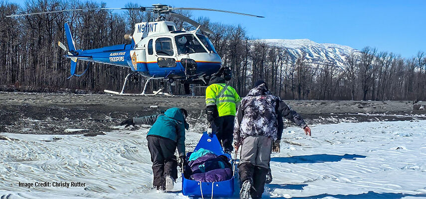 Freezing temperatures and exposure to wind create serious hypothermia risks. Wearing well-insulated winter gear from RefrigiWear protected Christy Rutter as she awaited rescue on the frozen Susitna River.