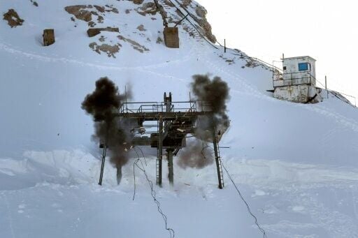 Explosives are set off at the Schneefernerkopf ski lift to start its demolition at the Zugspitze ski resort near Garmisch-Partenkirchen, southern Germany