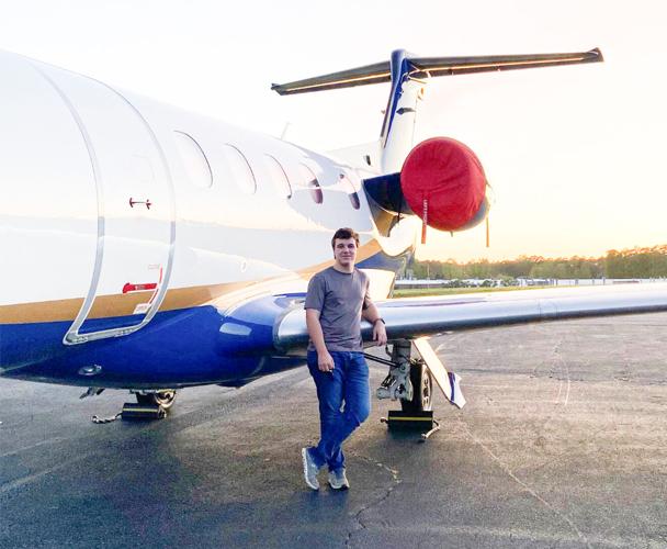 Brown becomes pilot at 16