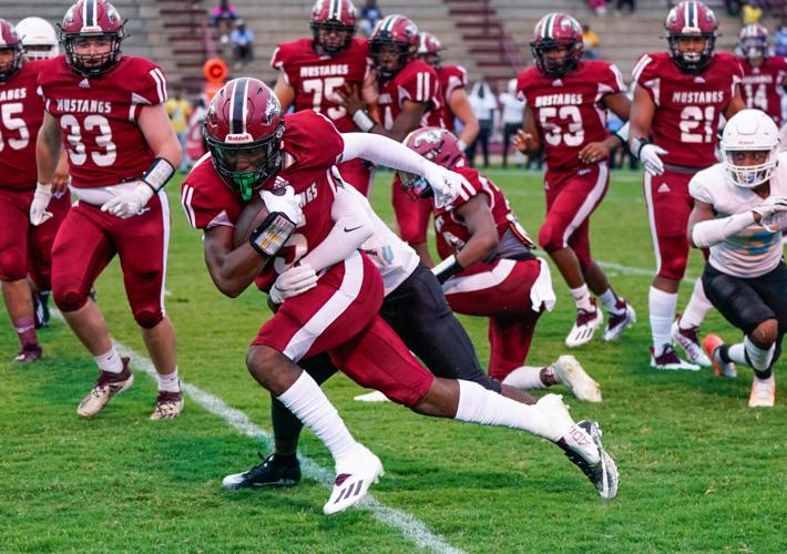 PHOTOS: Rain doesn't stop Stanhope Elmore's 37-0 shutout of Selma