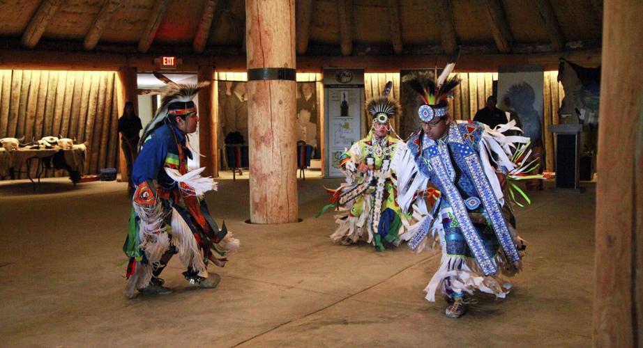 Dancers gather in an earthlodge at the MHA Interpretive Center in New Town, North Dakota, where visitors can experience the living cultures and traditions of the Mandan, Hidatsa and Arikara Nation. Credit: North Dakota Tourism.