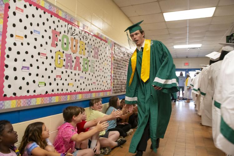PHOTOS: Holtville High seniors walk through elementary, middle and high schools