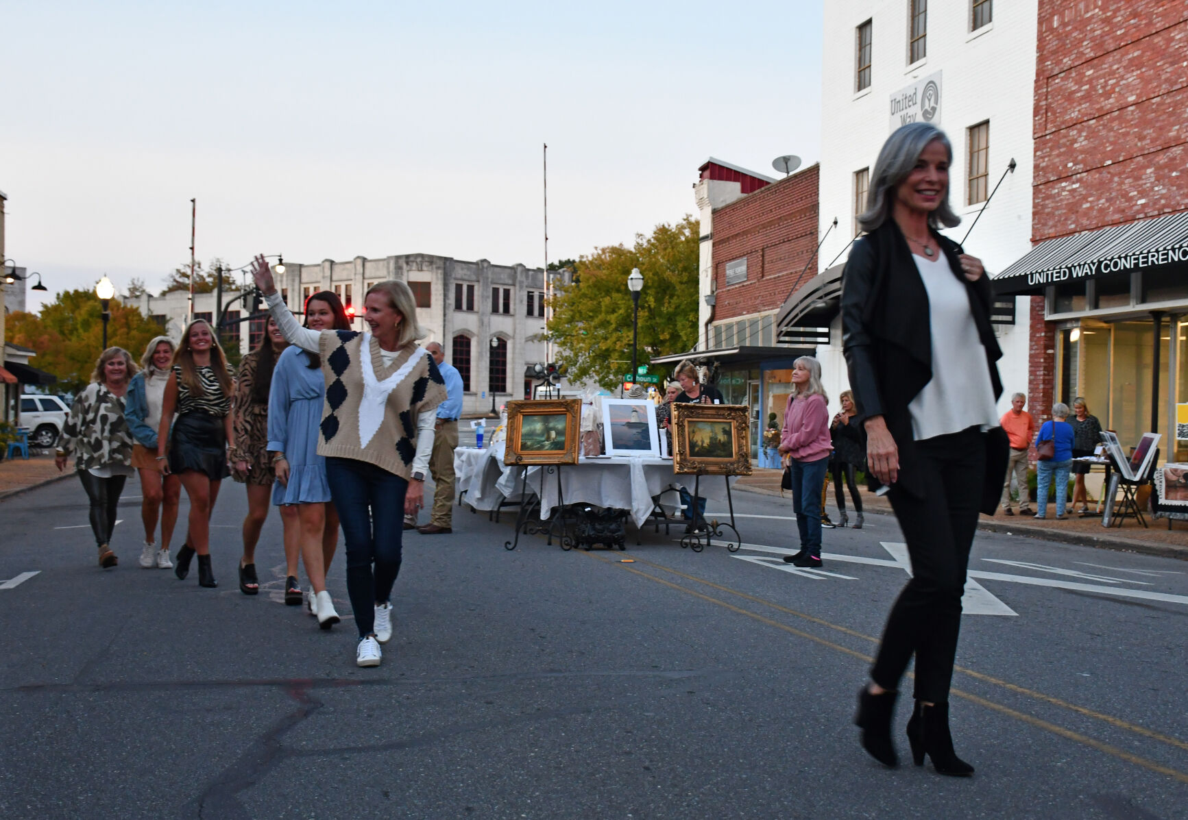 PHOTOS: Models strut down Main Street at 'Sip, Shop and Support'