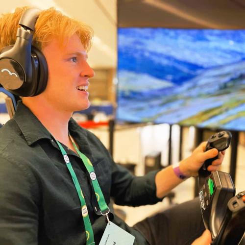 A visitor engages with a ROF™ immersive flight simulator during a live event. RoarFun™ provides compact, high-impact flight simulator rental solutions designed for high-traffic public activations, enabling brands and tourism boards to drive engagement a...