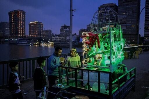 A millennium old and home to over 20 million people, Cairo is known for nights that come alive with traffic, noise and light from its roaring main roads, heaving markets and party boats that glow along the Nile river